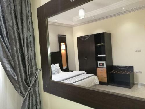 Apartamento Al Ezzah Palace Hotel Suites