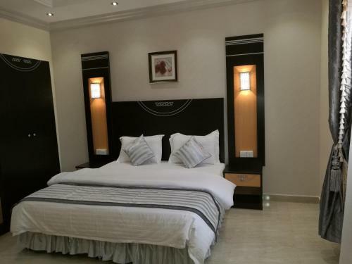 Apartamento Al Ezzah Palace Hotel Suites