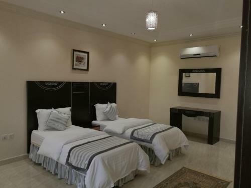 Apartamento Al Ezzah Palace Hotel Suites