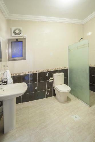 Apartamento Al Ezzah Palace Hotel Suites