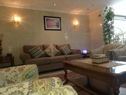 Apartamento Al Ezzah Palace Hotel Suites