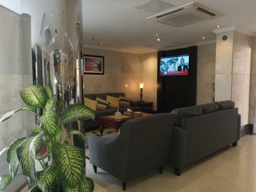 Apartamento Al Ezzah Palace Hotel Suites