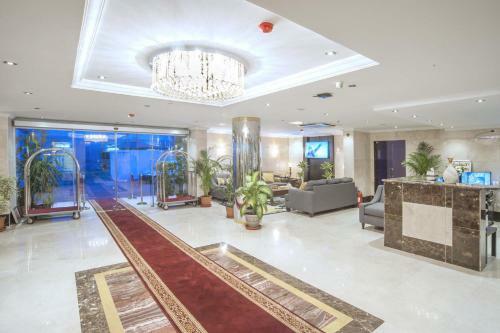Apartamento Al Ezzah Palace Hotel Suites