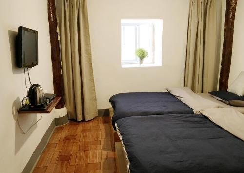 Daocheng Fanhegu Hostel