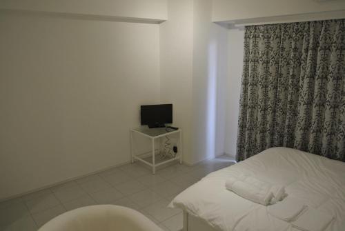 Apartamentos C'est Joli Ikegami