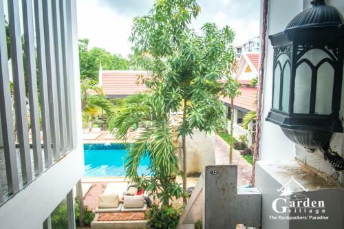 Hostal Garden Village Guesthouse & Pool Bar