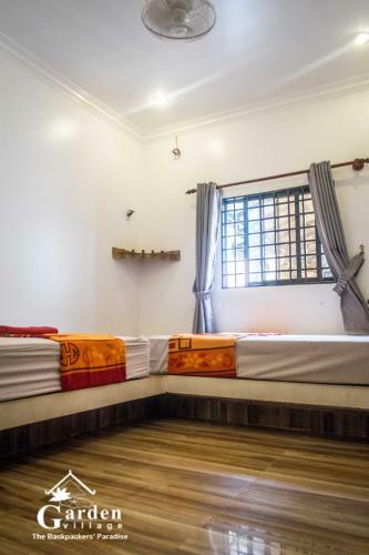 Hostal Garden Village Guesthouse & Pool Bar