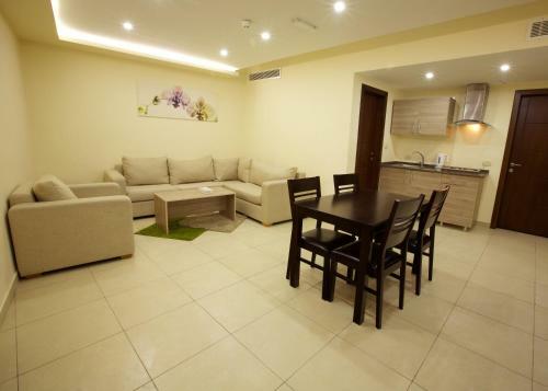 Apartamento Lujain Hotel Suites