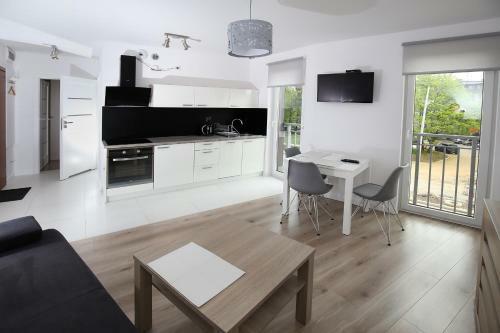100-sio Apartamenty
