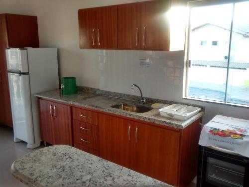 Apartamento Residencial Golfinhos