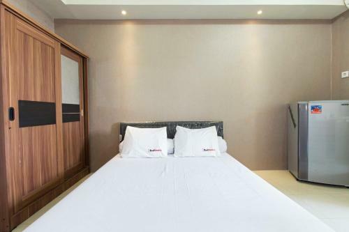 Hostal Reddoorz Apartment @ Pegangsaan Kelapa Gading