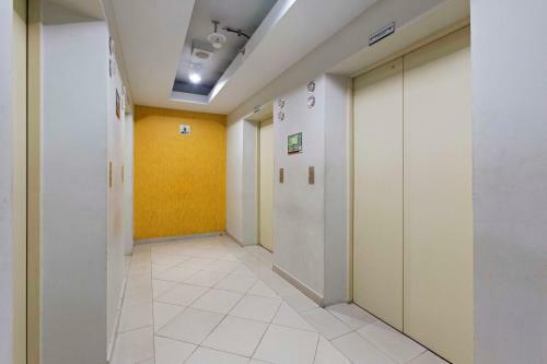 Hostal Reddoorz Apartment @ Pegangsaan Kelapa Gading