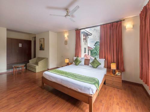 Aparthotel Treebo Orchard Suites