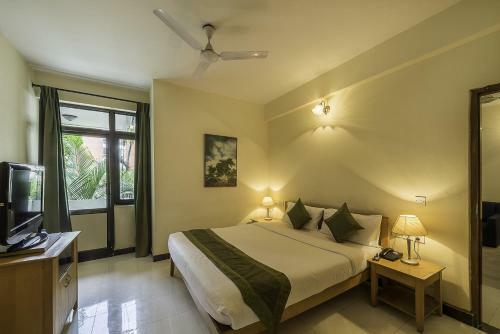 Aparthotel Treebo Orchard Suites