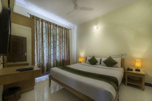 Aparthotel Treebo Orchard Suites