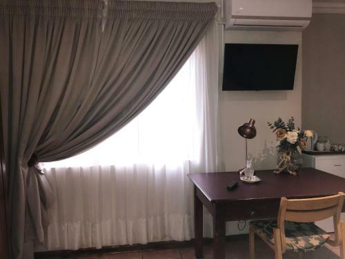 Hostal Tuscana Villa Guesthouse