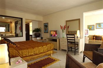 Apartamento Diani Reef Beach Resort And Spa