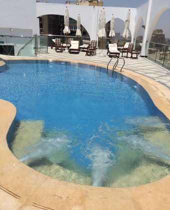 Om Kolthoom Hotel / Tower