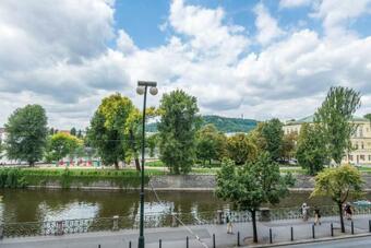 Riverside Apartment With A Balcony