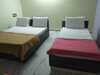 Hotel Iroomz K R Residency