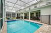 Elegant Centerpiece Pool Retreat In Champion Gates