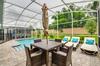 Elegant Centerpiece Pool Retreat In Champion Gates