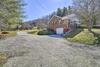 Quaint Creekside Home With Spacious Deck And Yard