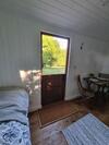 Shepherds Hut Surrounded By Fields And The Jurassic Coast