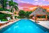 Chique Pool And Tiki Resort